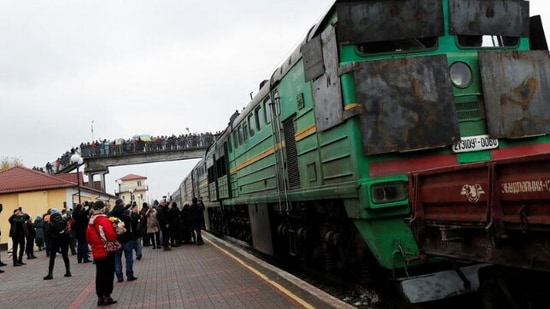 Passengers seen at the train station in Ukraine's Kherson. (Reuters)