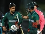 Bangladesh's Litton Das (L) and teammate Mahedi Hasan walk from the field after their team's victory in the first T20 vs New Zealand Bangladesh's Litton Das (L) and teammate Mahedi Hasan walk from the field after their team's victory in the first T20 vs New Zealand