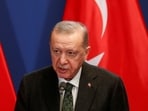 Turkish president Recep Tayyip Erdogan delivers statements.