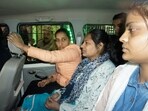 Neelam Azad, center, an accomplice in Wednesday's security breach in the Indian parliament. (AP)