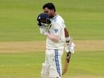 KL Rahul kisses his helmet after completing his century KL Rahul kisses his helmet after completing his century