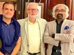 (L-R) Rahul Gandhi with Jeremy Corbyn and Sam Pitroda.