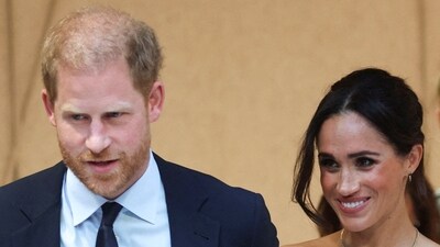 Britain's Prince Harry, Duke of Sussex and his wife Meghan, Duchess of Sussex, seen. (Reuters)