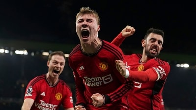 Manchester United's Rasmus Hojlund, center, celebrates scoring their side's third goal during the English Premier League soccer match between Manchester United and Aston Villa at the Old Trafford stadium (AP) Manchester United's Rasmus Hojlund, center, celebrates scoring their side's third goal during the English Premier League soccer match between Manchester United and Aston Villa at the Old Trafford stadium (AP)