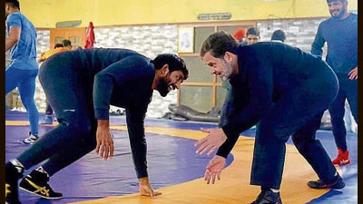 Congress leader Rahul Gandhi and Bajrang Punia in action during a wrestling dabble at an akhara in Jhajjar. (HT) Congress leader Rahul Gandhi and Bajrang Punia in action during a wrestling dabble at an akhara in Jhajjar. (HT)