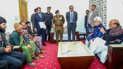 Defence minister Rajnath Singh and Jammu and Kashmir LG Manoj Sinha met families of the three civilians killed near the site of an anti-terrorist operation in Poonch (A. Bharat Bhushan Babu-X/ANI)