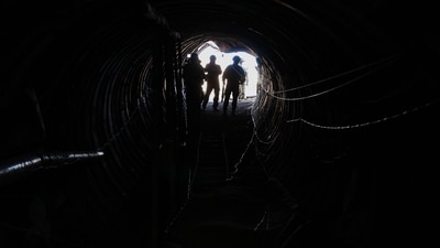 Israel-Hamas War: Israeli soldiers visit a tunnel that Hamas reportedly used to attack Israel through the Erez border crossing on October 7. (AFP) Israel-Hamas War: Israeli soldiers visit a tunnel that Hamas reportedly used to attack Israel through the Erez border crossing on October 7. (AFP)