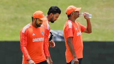 Centurion: India's coach Rahul Dravid with skipper Rohit Sharma and KL Rahul during a practice session ahead of the first Test cricket match between India and South Africa, in Centurion, South Africa (PTI) Centurion: India's coach Rahul Dravid with skipper Rohit Sharma and KL Rahul during a practice session ahead of the first Test cricket match between India and South Africa, in Centurion, South Africa (PTI)