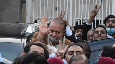 Pakistan's former Prime Minister Nawaz Sharif, center in brown coat, waves to his supporters as he leaves after a court hearing in Islamabad, Pakistan, Tuesday, Dec. 12, 2023. (AP) Pakistan's former Prime Minister Nawaz Sharif, center in brown coat, waves to his supporters as he leaves after a court hearing in Islamabad, Pakistan, Tuesday, Dec. 12, 2023. (AP)