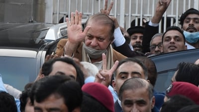 Pakistan's former Prime Minister Nawaz Sharif, center in brown coat, waves to his supporters as he leaves after a court hearing in Islamabad, Pakistan, Tuesday, Dec. 12, 2023. (AP) Pakistan's former Prime Minister Nawaz Sharif, center in brown coat, waves to his supporters as he leaves after a court hearing in Islamabad, Pakistan, Tuesday, Dec. 12, 2023. (AP)