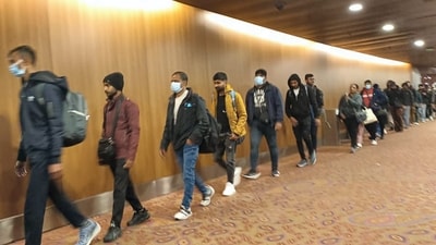Passengers of a charter aircraft, which was grounded in France for 4 days over suspected human trafficking, reach Mumbai. (PTI) Passengers of a charter aircraft, which was grounded in France for 4 days over suspected human trafficking, reach Mumbai. (PTI)