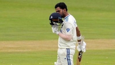 KL Rahul kisses his helmet after completing his century (AP) KL Rahul kisses his helmet after completing his century (AP)
