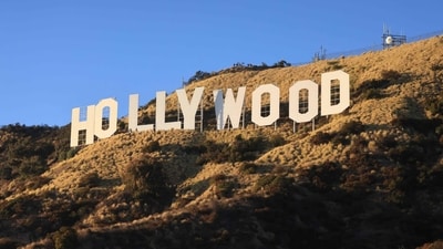 TOPSHOT - The Hollywood Sign is pictured during a ceremony marking the 100th anniversary of the first time it was lit, in Los Angeles, California, on December 8, 2023. (Photo by DAVID SWANSON / AFP) (AFP) TOPSHOT - The Hollywood Sign is pictured during a ceremony marking the 100th anniversary of the first time it was lit, in Los Angeles, California, on December 8, 2023. (Photo by DAVID SWANSON / AFP) (AFP)