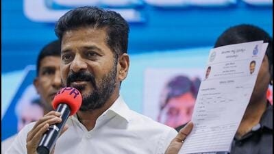Telangana chief minister A. Revanth Reddy after launching 'Praja Palana' (Abhaya Hastham) application form at the state secretariat, in Hyderabad on Wednesday. (PTI) Telangana chief minister A. Revanth Reddy after launching 'Praja Palana' (Abhaya Hastham) application form at the state secretariat, in Hyderabad on Wednesday. (PTI)