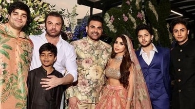 For the wedding, Arbaaz wore a floral bandhgala with beige trousers while matching with his bride Shura, who wore a floral peach-colored lehenga for the nikah ceremony. (Instagram) For the wedding, Arbaaz wore a floral bandhgala with beige trousers while matching with his bride Shura, who wore a floral peach-colored lehenga for the nikah ceremony. (Instagram)