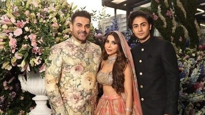 Arbaaz's son from his previous marriage with Malaika Arora, Arhaan Khan, also posed with his father and his new wife (Instagram) Arbaaz's son from his previous marriage with Malaika Arora, Arhaan Khan, also posed with his father and his new wife (Instagram)