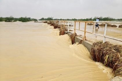 A man walks through a flooded road in the city of al-Ghaydah in Yemen in October after a tropical cyclone caused floods. ( CREDIT: AFP) A man walks through a flooded road in the city of al-Ghaydah in Yemen in October after a tropical cyclone caused floods. ( CREDIT: AFP)