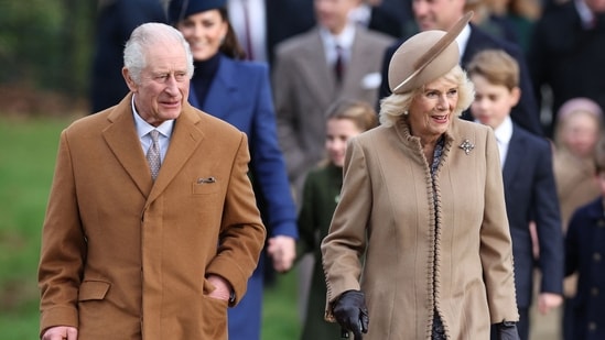 King Charles III (L) and Britain's Queen Camilla (R) arrive for the Royal Family's traditional Christmas Day service.(AFP)