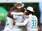South Africa's Kagiso Rabada celebrates with teammates