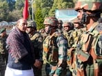 Defence Minister Rajnath Singh interacts with the Army troops during his visit to the border areas of Jammu and Kashmir, on Wednesday. Indian Army Chief General Manoj Pande is also seen. (ANI)