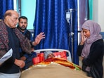 Defence Minister Rajnath Singh visits a civilian allegedly injured in “military custody”, at Government Medical College in Jammu & Kashmir, on Wednesday. (PTI)