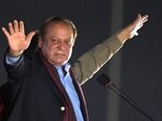 Pakistan's former prime minister Nawaz Sharif waves to his supporters.