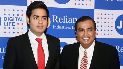 Reliance Jio Chairman Akash Ambani with father Mukesh Ambani. Reliance Jio Chairman Akash Ambani with father Mukesh Ambani.