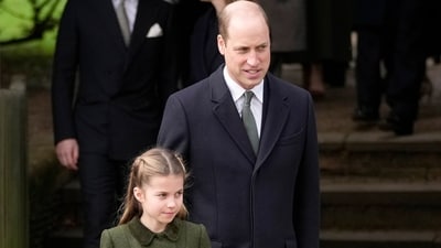 Britain's Prince William and Princess Charlotte leave after attending the Christmas day service at St Mary Magdalene Church in Sandringham. (AP) Britain's Prince William and Princess Charlotte leave after attending the Christmas day service at St Mary Magdalene Church in Sandringham. (AP)