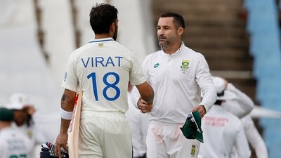 South Africa's Dean Elgar (R) shakes hands with India's Virat Kohli (L) after South Africa won the first Test (AFP)