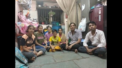 Cousins Mukesh Makwana and Girish (right and second right) each live in tiny 1RK flats with family, paying ₹10,000 by way of rent and utilities. (Anshuman Poyrekar/ht photo) Cousins Mukesh Makwana and Girish (right and second right) each live in tiny 1RK flats with family, paying ₹10,000 by way of rent and utilities. (Anshuman Poyrekar/ht photo)