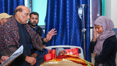 Defence Minister Rajnath Singh visits a civilian allegedly injured in “military custody”, at Government Medical College in Jammu & Kashmir, on Wednesday. (PTI) Defence Minister Rajnath Singh visits a civilian allegedly injured in “military custody”, at Government Medical College in Jammu & Kashmir, on Wednesday. (PTI)