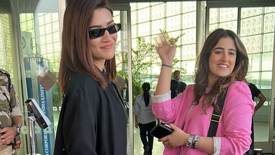 Kriti Sanon and sister Nupur Sanon also headed for their New Year vacation. While Kriti sported an all black look, Nupur wore a breezy floral dress paired with a pink blazer. Kriti Sanon and sister Nupur Sanon also headed for their New Year vacation. While Kriti sported an all black look, Nupur wore a breezy floral dress paired with a pink blazer. 