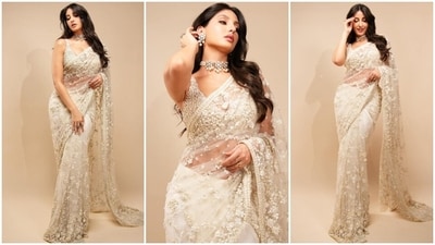 Lastly, Nora styled her ethnic attire with a pearl and diamonds-adorned choker necklace, matching earrings, and dainty statement rings. Centre-parted wavy locks, shimmery eye shadow, kohl-lined eyes, mascara-adorned lashes, feathered brows, and rosy-hued lip shade gave the finishing touch. (Instagram) Lastly, Nora styled her ethnic attire with a pearl and diamonds-adorned choker necklace, matching earrings, and dainty statement rings. Centre-parted wavy locks, shimmery eye shadow, kohl-lined eyes, mascara-adorned lashes, feathered brows, and rosy-hued lip shade gave the finishing touch. (Instagram)