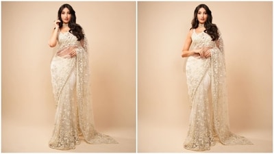 Earlier, Nora had dropped photos of an ethnic look she wore to attend the Umang 2023 cultural extravaganza. She wore an ivory embellished saree from the shelves of designer Seema Gujral's label. The net drape comes decked in white paillettes and silver sequins embroidered in cherry blossom patterns. She teamed the six yards with a matching sleeveless blouse featuring a plunging neckline. (Instagram) Earlier, Nora had dropped photos of an ethnic look she wore to attend the Umang 2023 cultural extravaganza. She wore an ivory embellished saree from the shelves of designer Seema Gujral's label. The net drape comes decked in white paillettes and silver sequins embroidered in cherry blossom patterns. She teamed the six yards with a matching sleeveless blouse featuring a plunging neckline. (Instagram)