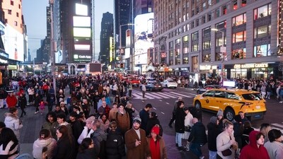 Tourists in the Times Square neighbourhood of New York, US. (Bloomberg) Tourists in the Times Square neighbourhood of New York, US. (Bloomberg)