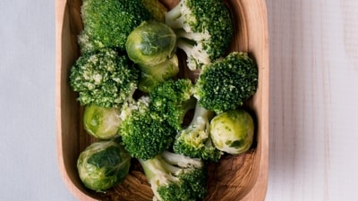 4. Cruciferous vegetables such as broccoli and kale are low-calorie and contain cancer-fighting compounds. If you are not a fan of greens, get creative with cooking – try steaming, grilling, roasting, or even make them into a warm bowl of soup to fight the winter blues. (File Photo) 4. Cruciferous vegetables such as broccoli and kale are low-calorie and contain cancer-fighting compounds. If you are not a fan of greens, get creative with cooking – try steaming, grilling, roasting, or even make them into a warm bowl of soup to fight the winter blues. (File Photo)