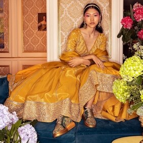 Embroidered sneakers with lehengas are winning hearts this season Embroidered sneakers with lehengas are winning hearts this season
