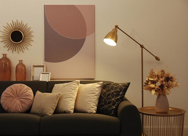 Lighting is crucial. Dark corners need only soft light to turn them into cosy nooks. Consider pendant lights with sleek lines or statement floor lamps that can be moved. (Shutterstock) Lighting is crucial. Dark corners need only soft light to turn them into cosy nooks. Consider pendant lights with sleek lines or statement floor lamps that can be moved. (Shutterstock)