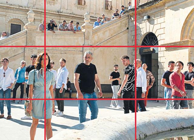 In this famous scene from The White Lotus S2, Aubrey Plaza’s off-centre positioning attracts the audience’s eye. Since the men occupy the remaining two-thirds of the shot, the viewer feels overwhelmed, just like Plaza’s character does. In this famous scene from The White Lotus S2, Aubrey Plaza’s off-centre positioning attracts the audience’s eye. Since the men occupy the remaining two-thirds of the shot, the viewer feels overwhelmed, just like Plaza’s character does.