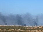 Smoke rises over Gaza, amid the ongoing conflict between Israel and the Palestinian Islamist group Hamas, 