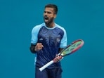 India's Sumit Nagal celebrates a point against Kazakhstan's Beibit Zhukayev during the men's singles tennis match at the 19th Asian Games