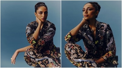Sobhita's dazzling pantsuit look is sure to steal your heart, featuring elbow-length sleeves, an open buttoned blazer with quirky multi-coloured embroidery and sequin detailing all over. She paired it with matching flared trousers to add to the glam factor. (Instagram/@sobhitad)