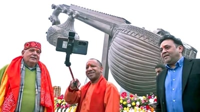 Uttar Pradesh Chief Minister Yogi Adityanath takes a selfie after inspecting the ground where Prime Minister Narendra Modi will be holding a rally on December 30, in Ayodhya on Friday. (ANI)