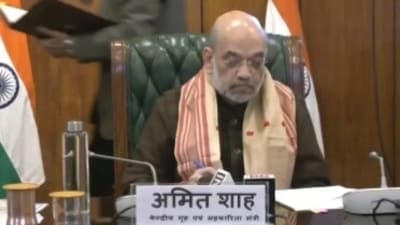Union home minister Amit Shah signing the agreement. Union home minister Amit Shah signing the agreement.