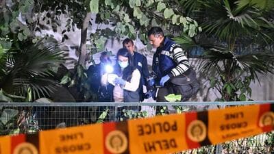 Forensic team scans the area after the blast. (HT Photo) Forensic team scans the area after the blast. (HT Photo)