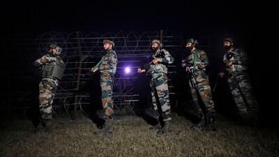 Indian Army soldiers stand guard near the Line of Control (LoC) after an infiltration attempt by four heavily-armed terrorists at Akhnoor, in Jammu district, Saturday. (PTI) Indian Army soldiers stand guard near the Line of Control (LoC) after an infiltration attempt by four heavily-armed terrorists at Akhnoor, in Jammu district, Saturday. (PTI)
