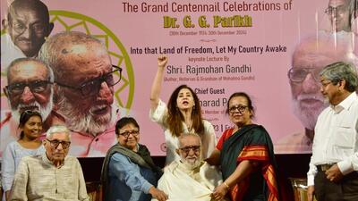 Mumbai, India – Dec 29, 2023: Rajmohan Gandhi (grandson of Mahatma Gandhi) along with Dr G. G Parikh (Freedom Fighter) at the "Into That Land of Freedom, Let My Country Awake" lecture, on the occasion of Dr G. G Parikh 100 years birth ceremony at Mumbai University convocation hall, in Mumbai, India, on Friday, Dec 29, 2023. (Photo by Bhushan Koyande/HT Photo) Mumbai, India – Dec 29, 2023: Rajmohan Gandhi (grandson of Mahatma Gandhi) along with Dr G. G Parikh (Freedom Fighter) at the "Into That Land of Freedom, Let My Country Awake" lecture, on the occasion of Dr G. G Parikh 100 years birth ceremony at Mumbai University convocation hall, in Mumbai, India, on Friday, Dec 29, 2023. (Photo by Bhushan Koyande/HT Photo)