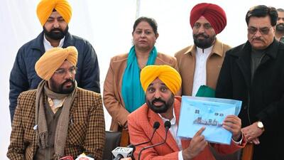 Punjab chief minister Bhagwant Mann addressing the press conference in Ludhiana on Friday as cabinet minister Kuldeep Singh Dhaliwal (left) along with MLAs look on. (Gurpreet Singh/HT) Punjab chief minister Bhagwant Mann addressing the press conference in Ludhiana on Friday as cabinet minister Kuldeep Singh Dhaliwal (left) along with MLAs look on. (Gurpreet Singh/HT)