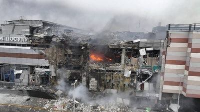 Firefighters work in ruins of a mall damaged in Russia's most massive missile attack in Dnipro, Ukraine. (AP) Firefighters work in ruins of a mall damaged in Russia's most massive missile attack in Dnipro, Ukraine. (AP)