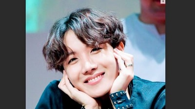 Laughter booms out as the two share a light-hearted moment, with Jhope jokingly expressing the challenges of having hair trimmings end up in his mouth. Laughter booms out as the two share a light-hearted moment, with Jhope jokingly expressing the challenges of having hair trimmings end up in his mouth.